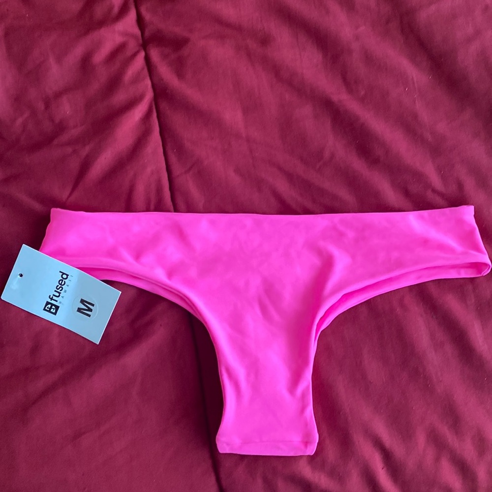 Fused Hawaii.   Bright pink Manini bottoms M
